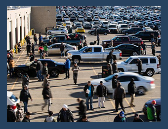 Image of auto auction. SRS offers repossession services, vehicle remarketing and title management services. 