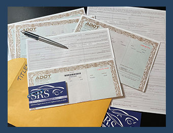 Image of car titles. SRS offers repossession services, vehicle remarketing and title management services. 
